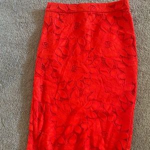 Bebe never been worn red lace skirt. Size 4